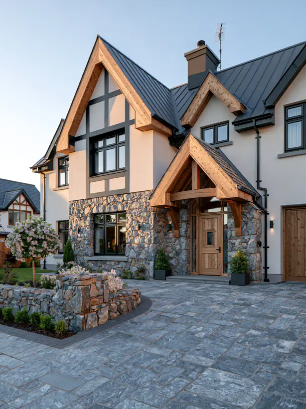 Stone-and-timber modern Tudor with a warm cedar entry porch and a metal roof